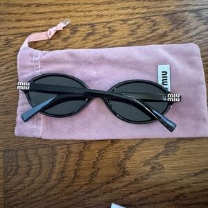 Miu Miu Black Oval Sunglasses with Pink Case